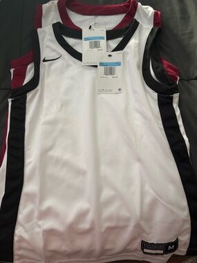 2 girls size medium Nike basketball jersey
